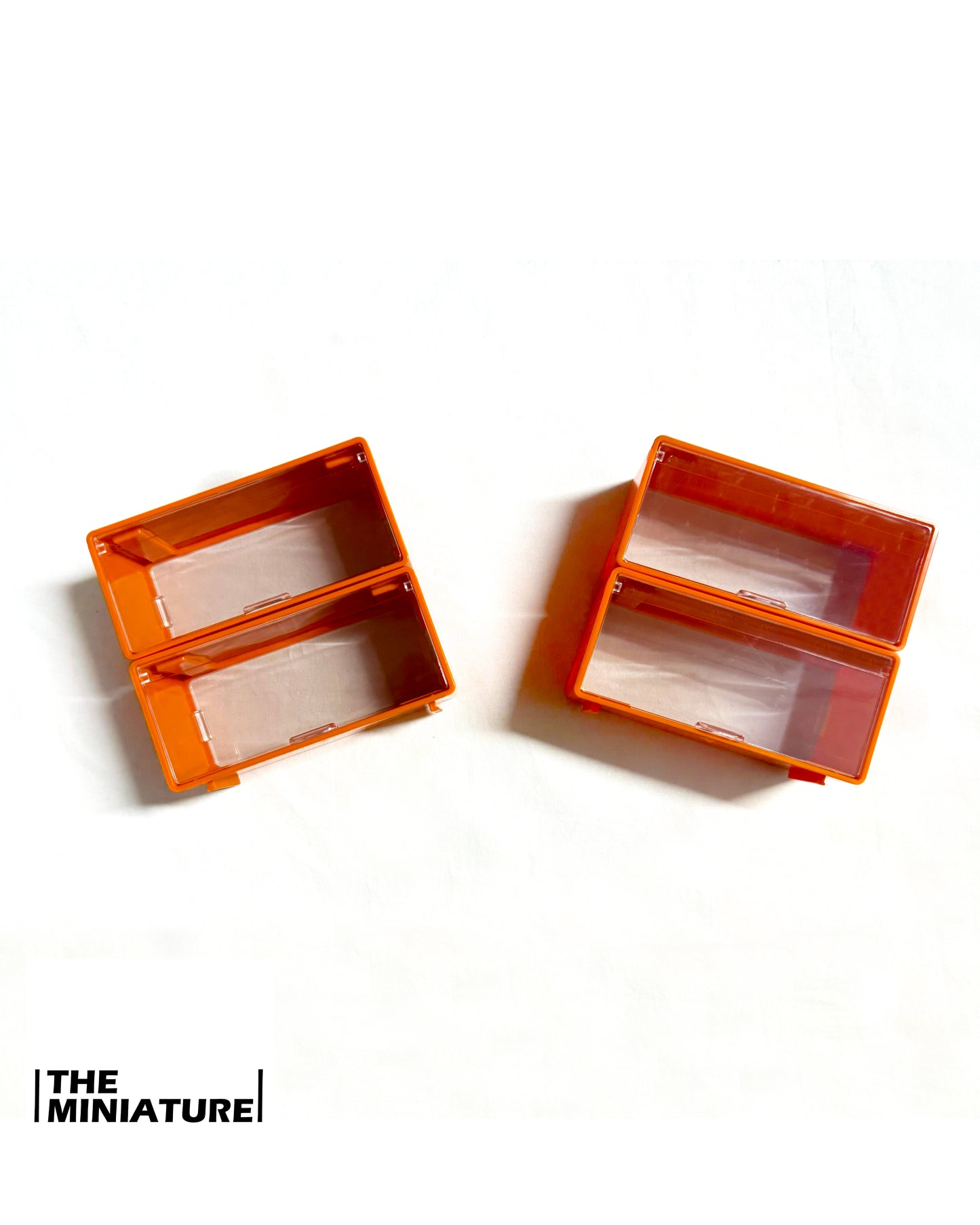 Miniature ShowBox Clear – Gray/Orange Frame (1:64 Collector Case)